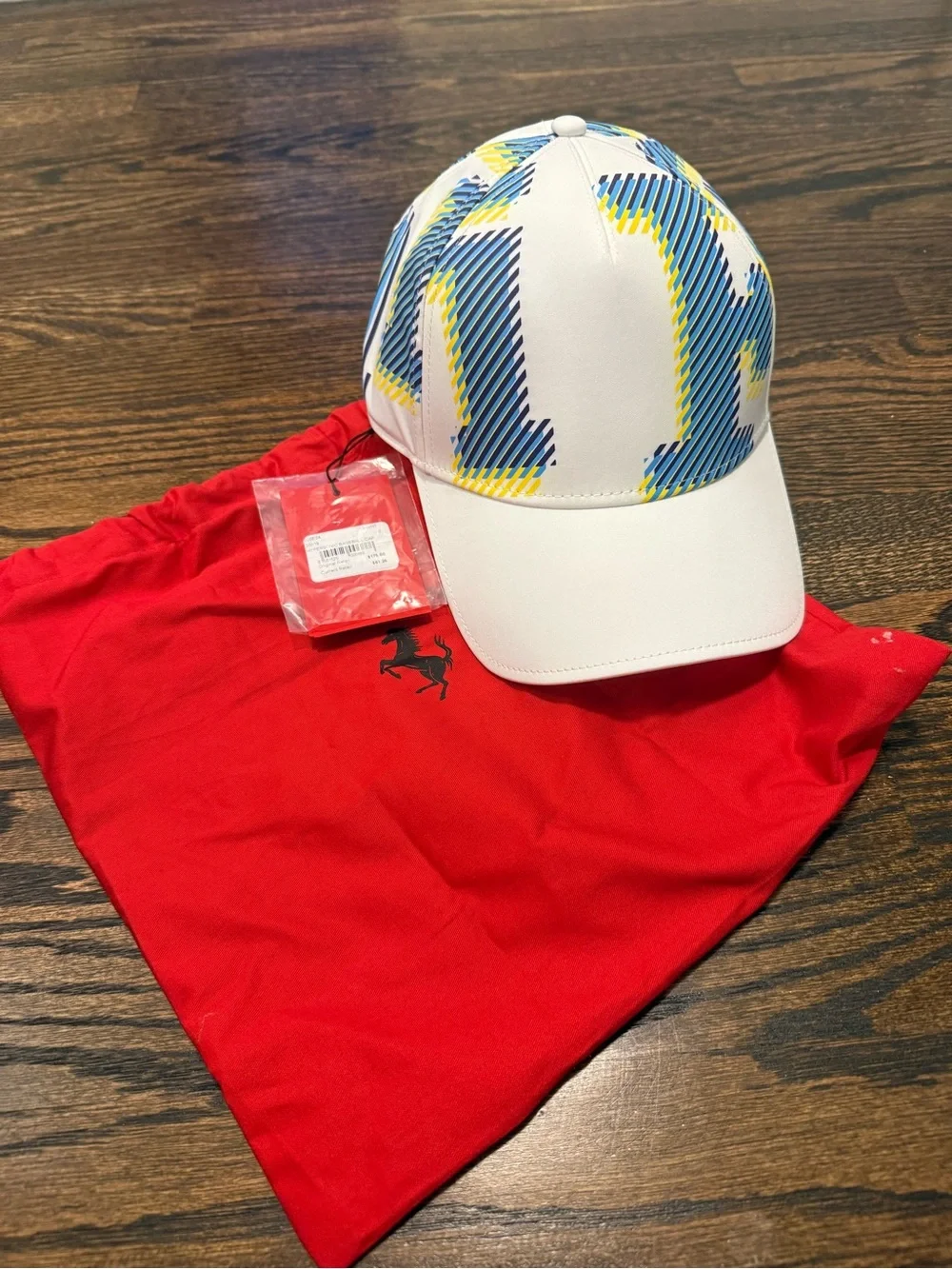 Scuderia Ferrari White Cap with Blue and Yellow Graphics